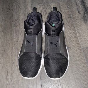 Black puma sneakers with green/purple monochrome